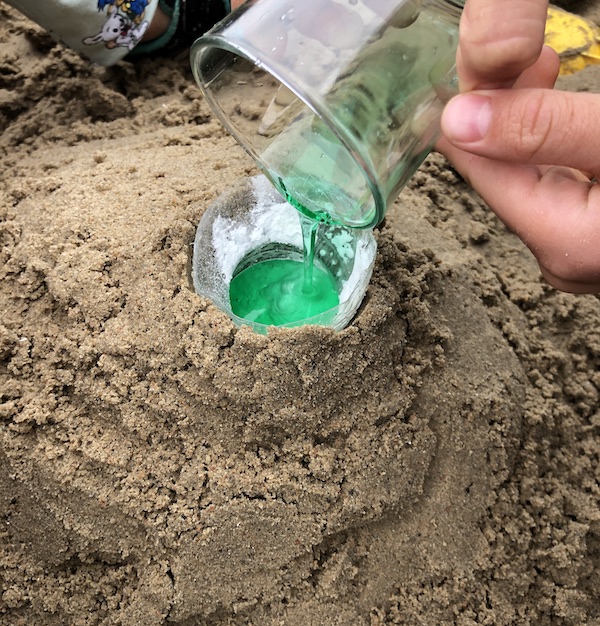 Adding washing up liquid to the model Martian volcano
