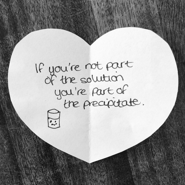 Science joke for kids on a white paper heart: If you’re not part of the solution, you’re part of the precipitate.